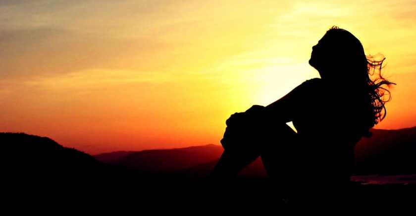woman-sunset-sky-silhouette-wide